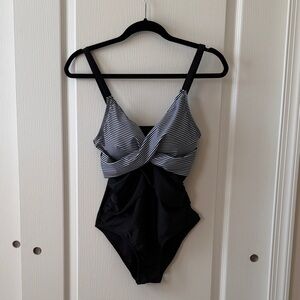 Chic Black One-Piece Swimsuit with Striped Side Panels